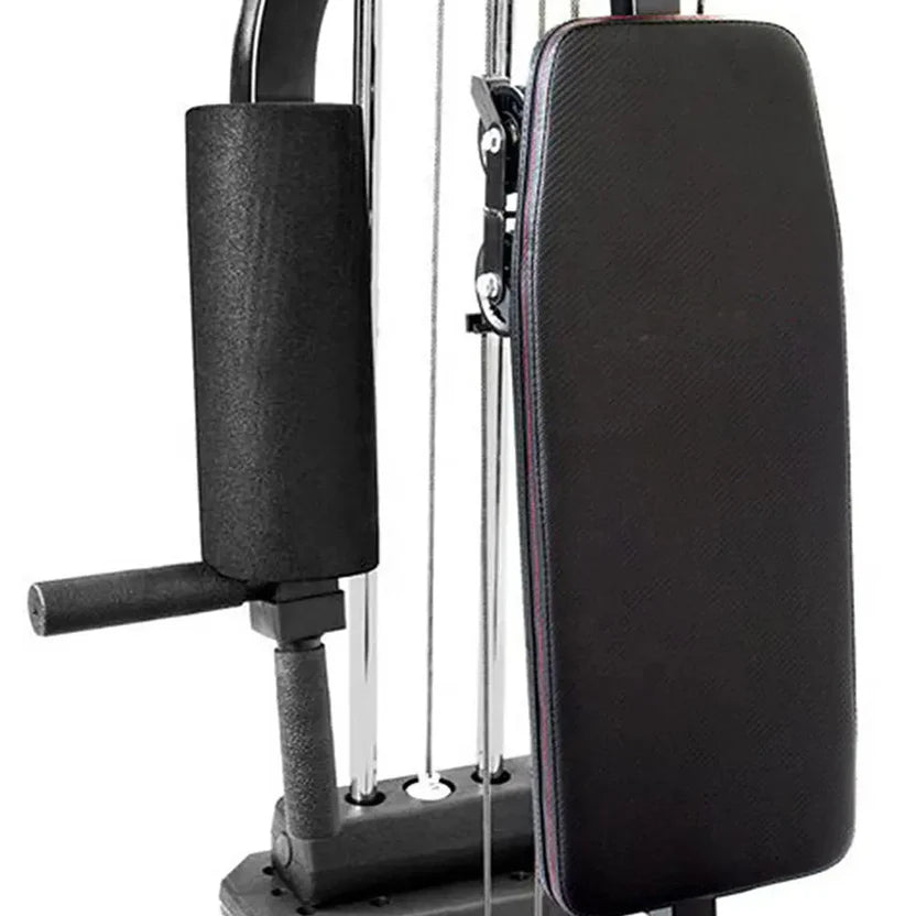 Black gym machine with padding on a white background