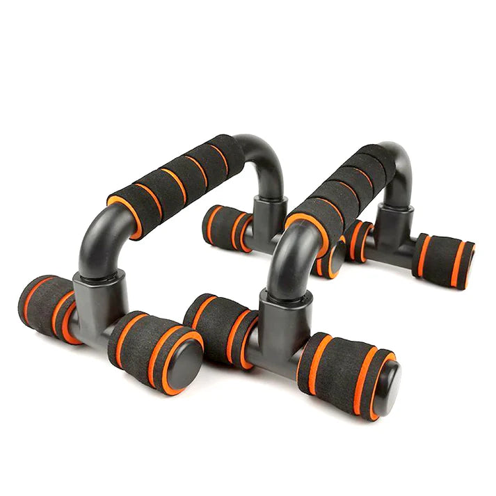 Set of black and orange push-up handles on a white background