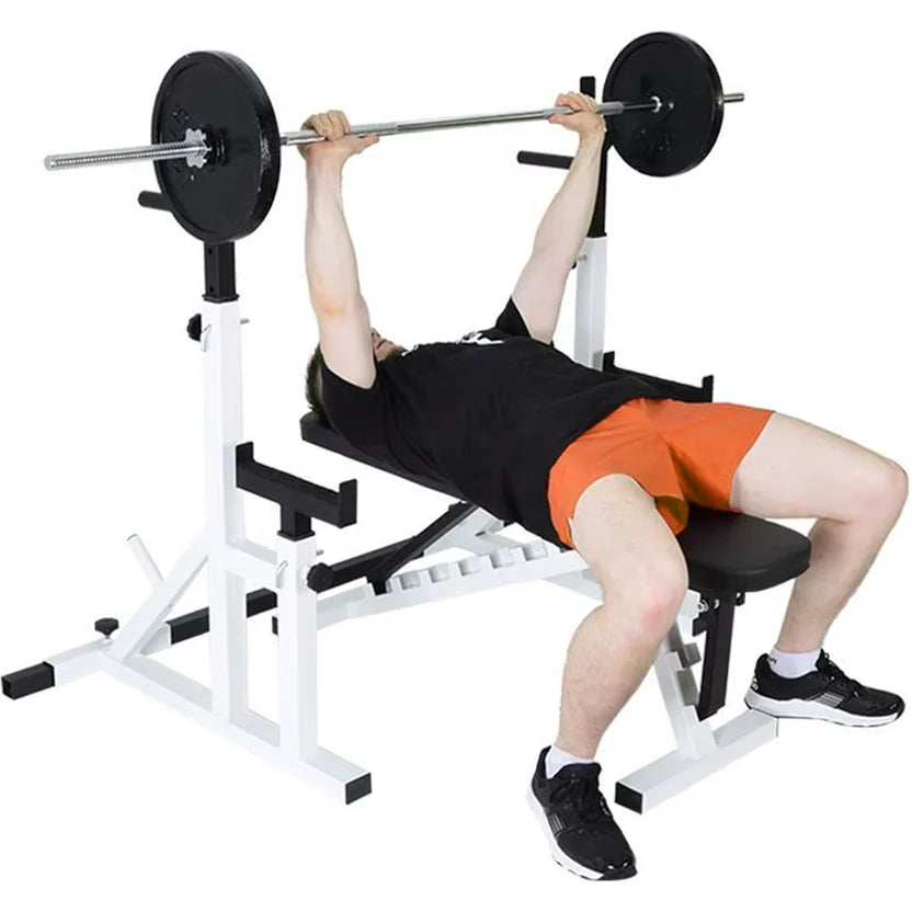 Person performing a bench press with a barbell on a weight bench.
